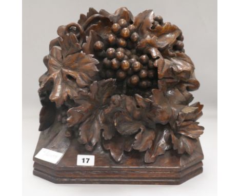 An oak carved wall bracket of fruit, 1880, carved by Harry Fletcher