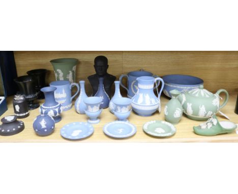 A collection of Wedgwood Jasperware, etc., in green, pale blue, dark blue and black colourways, including a teapot, loving cu