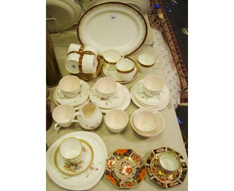 A Coalport Red Wheat pattern tea cups & saucers; EB Foley 1850 bone china decorated with wild flowers part tea service compri