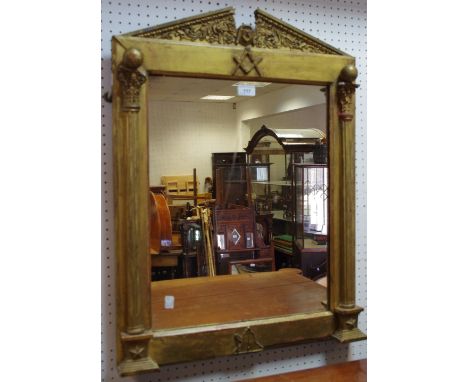 A 19th century Masonic giltwood looking glass, broken architectural pediment, with Masonic compass, he plate flanked by Corin
