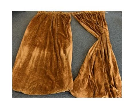 A pair of substantial country house russet velvet curtains, each curtain 300cm drop, 150cm wide