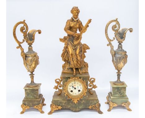 An 8 day French gilt metal and faux marble mantle clock and urn garnitures . With 3" dial decorated with flowers and ribbons.