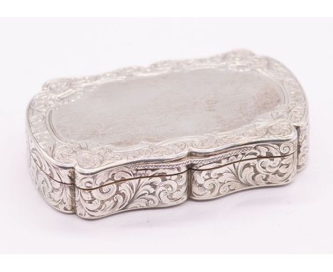 A Victorian silver table snuff box, cartouche shaped profusely engraved scrolling foliage decoration to side and base, the co