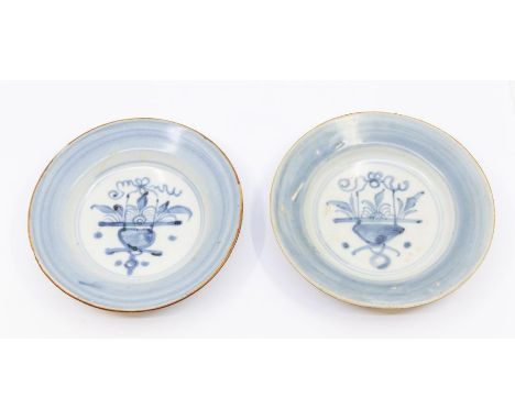 A pair of Chinese provincial (Fujian) porcelain blue and white small dishes, Qing Dynasty, 18th Century, each painted with ba