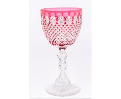 A large Bohemian ruby and clear glass hob nail cut goblet, on knopped stem, the base with astragal decoration, 25.5 cm high&n