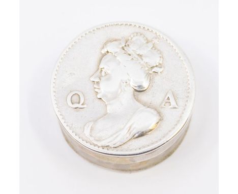 An early 18th Century silver patch box and cover, the cover with embossed profile portrait of Queen Anne and letters Q A, the