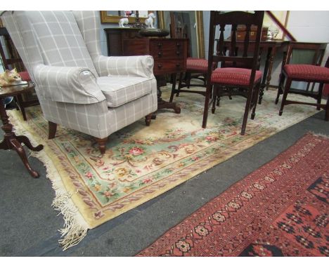 A yellow ground Chinese carpet, 325cm x 230cm