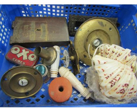 A tray of miscellaneous bygones including brass and ceramic bell push, brass toilet door coin operated lock, cast iron letter