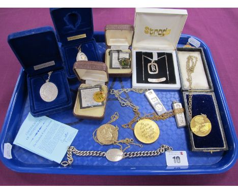 Hallmarked Silver Gilt and Other Medallion Style Pendants, a hallmarked silver ingot pendant, Franklin Mint egg pendant, enam