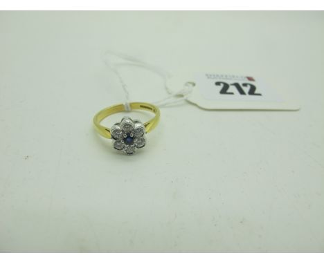 An 18ct Gold Diamond Set Cluster Ring, (finger size M) (3.3grams). 