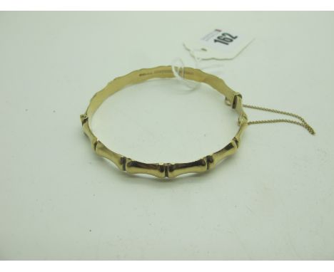 A 9ct Gold Hinged Bangle, of bamboo design (7.5grams). 