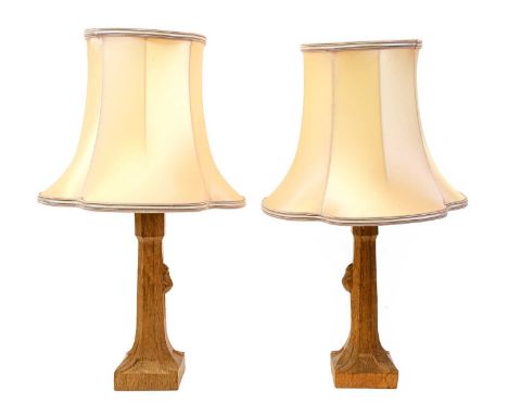 Workshop of Robert Mouseman Thompson (Kilburn): Two English Oak Table Lamps, octagonal columns on a square base, each with ca