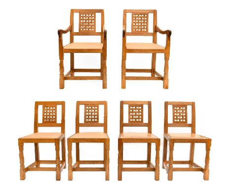 Workshop of Robert Mouseman Thompson (Kilburn): A Set of Six (4+2) English Oak Lattice Back Dining Chairs, tan cow hide seats