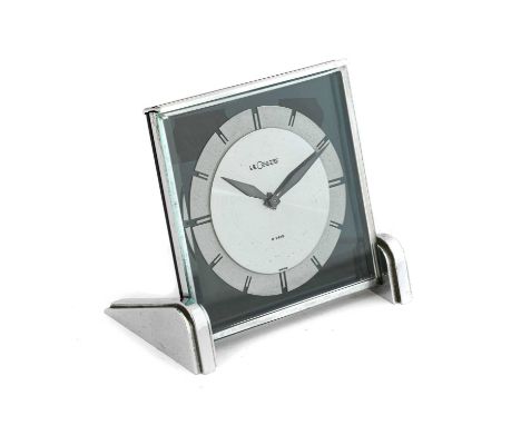 An Art Deco 8 Day Desk Clock, by Garrard LeCoultre, circa 1935, manual would movement, cut out outer chapter ring, black loze