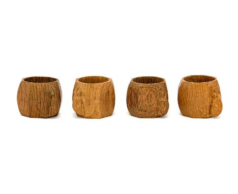 Workshop of Robert Mouseman Thompson (Kilburn): Four English Oak Napkin Rings, of standard octagonal form, each with carved m