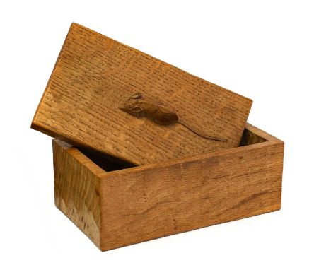 Workshop of Robert Mouseman Thompson (Kilburn): An English Oak Trinket Box and Cover, of rectangular form, the cover with car