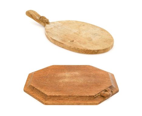 Workshop of Robert Mouseman Thompson (Kilburn): An English Oak Cheese Board, post 1970, of standard form, with carved mouse t