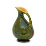 Christopher Dresser (Scottish, 1834-1904) for Linthorpe Pottery: A Jug, decorated with repeating