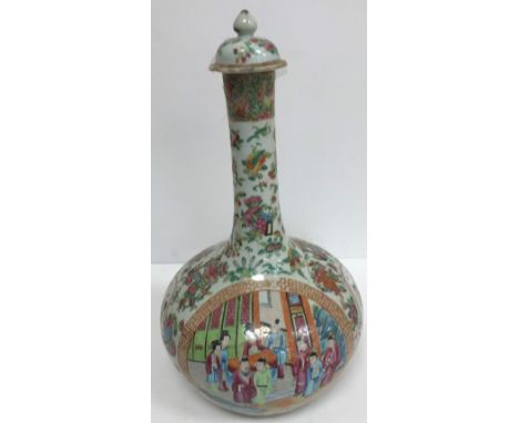 An early 19th Century Chinese famille rose gourd shaped vase and cover, the main body decorated with panels of figures in int