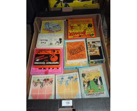 A TRAY OF VINTAGE PARTY GAMES TOGETHER WITH A TRAY OF VINTAGE PLAYING CARDS