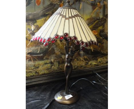 A TIFFANY STYLE FIGURATIVE TABLE LAMP