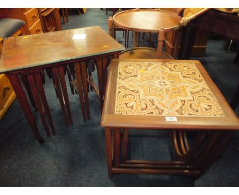 A RETRO TEAK TILE TOPPED NEST OF TABLES TOGETHER WITH ANOTHER NEST OF TABLES AND A TROLLEY