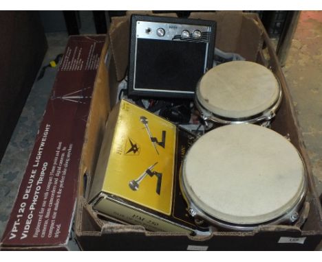 A TRAY OF MUSIC RELATED ITEMS TO INCLUDE BONGO DRUMS, MICROPHONES, AMP ETC. 