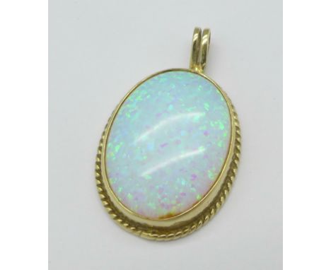 A 9ct gold and synthetic opal pendant, 4.2g