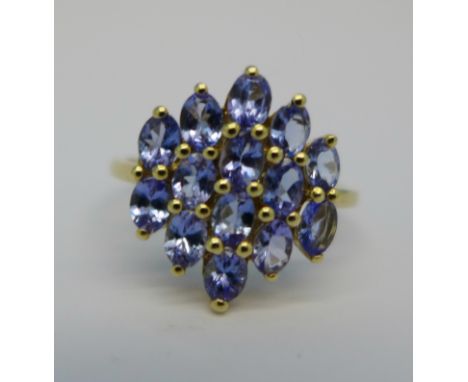 A 9ct gold and tanzanite cluster ring, 2.9g, S, resized, shank worn