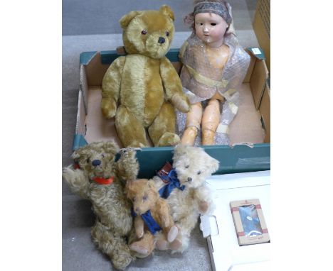 A miniature Steiff Teddy bear, Blue 7, in presentation box, a 'Big Softie' Teddy bear with growler, three other Teddy bears a