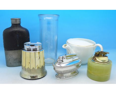 Three lighters, a glass Horlicks mixer, a hip flask and a nursing cup