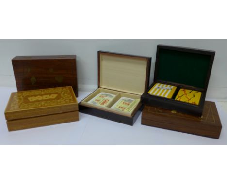 Five inlaid playing card boxes, two with cards