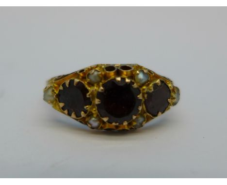 A 9ct gold, garnet and pearl ring, 1.6g, Q