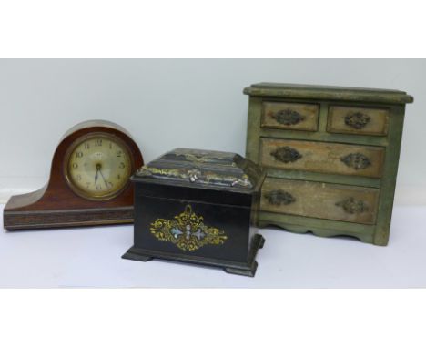 An 8-day mantel clock, a small pine painted chest and a 19th Century Japanned tea caddy, with mother of pearl decoration, hin