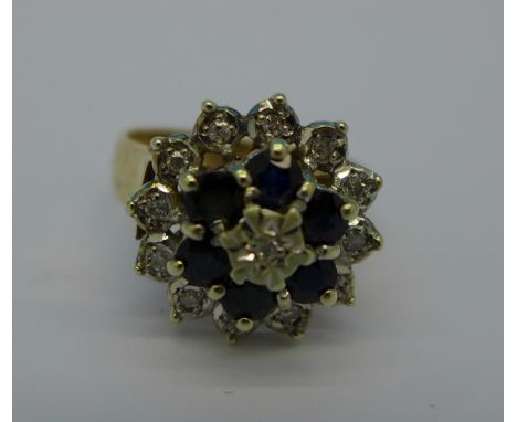 A 9ct gold, sapphire and diamond cluster ring, 4.6g, N