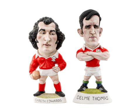 RUGBY UNION CLUB HOUSE: THE WORLD OF GROGGS Gareth Edwards holding a rugby ball, signed by Richard Hughes, and Delme Thomas w