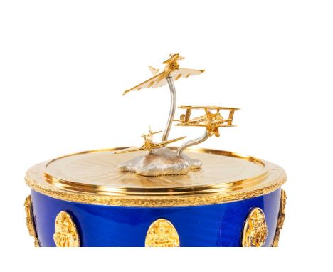 THE MILITARY CLUB HOUSE: THEO FABERGÉ "MILESTONES OF FLIGHT" EGG, silver gilt and guilloché enamel, for RAF Museum Hendon in 