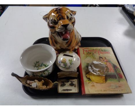 A tray of Portmeirion miniature chamber pot, Wade longboat and whimsies, pottery figure of a tiger, cuff links, stamp roller 