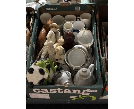 A box containing assorted china to include figures, Japanese eggshell tea service, commemorative mugs, vases etc. 