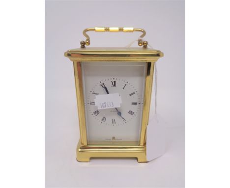 A French brass cased eight day carriage clock 