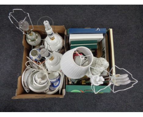 Two boxes containing assorted table lamps with shades, wall plates, a ceramic fruit table centre piece, dinner ware, place ma