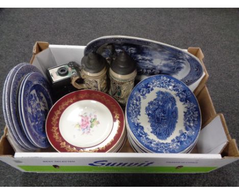 A box containing 19th century meat plate, beer steins, ironstone oval dishes, camera etc. 