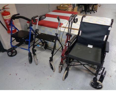 A folding light weight wheel chair together with three further mobility aids 