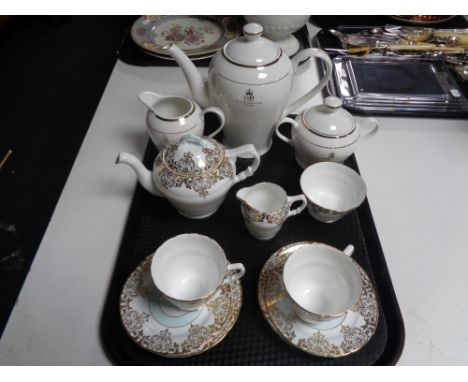 A nine piece Sutherland bone china tea for two, together with a Queen Elizabeth II Golden Jubilee teapot, milk jug and sugar 