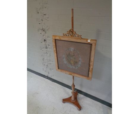 A Victorian tapestry pole screen. 
