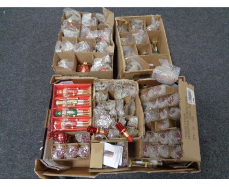 Two boxes of a quantity of Christmas decorations, nutcracker figures