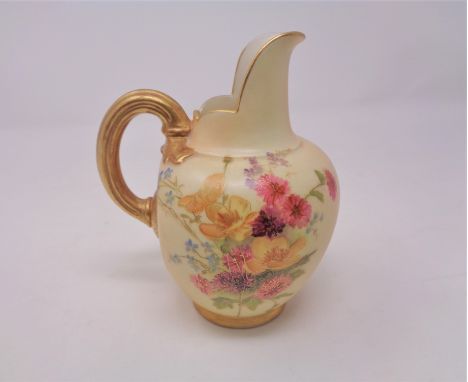 A Royal Worcester blush ivory gilded handled jug, height 13.3 cm 