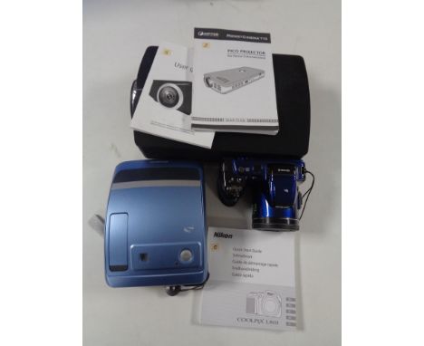 A tray of Nikon Coolpix camera, Polaroid camera, together with a Aiptex Pico projector 