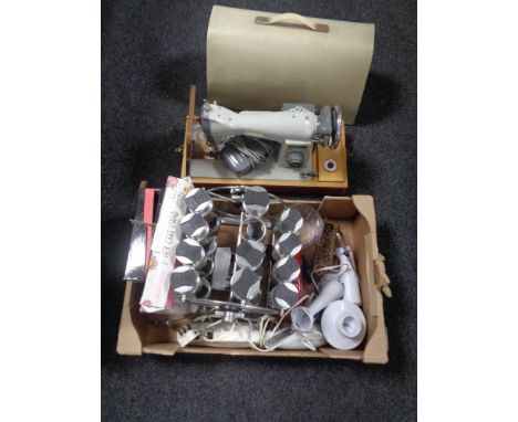 A cased Jones electric sewing machine together with a box containing kitchen electricals, spice rack etc 