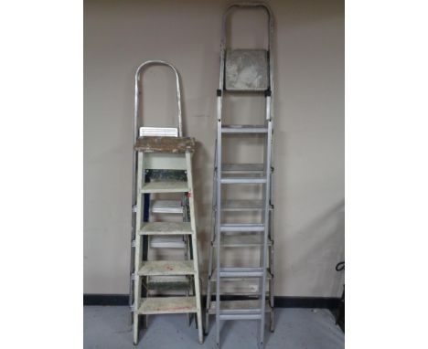 Two pairs of folding steps together with aluminium ladder and wooden steps 